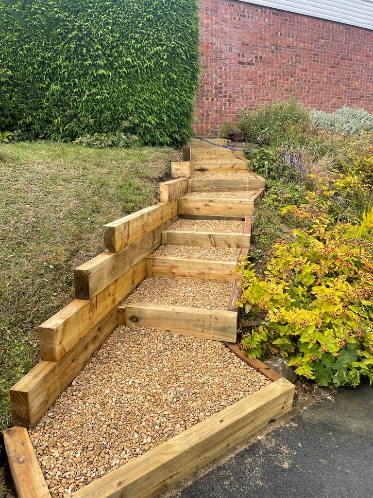 Timber sleeper and gravel garden steps
